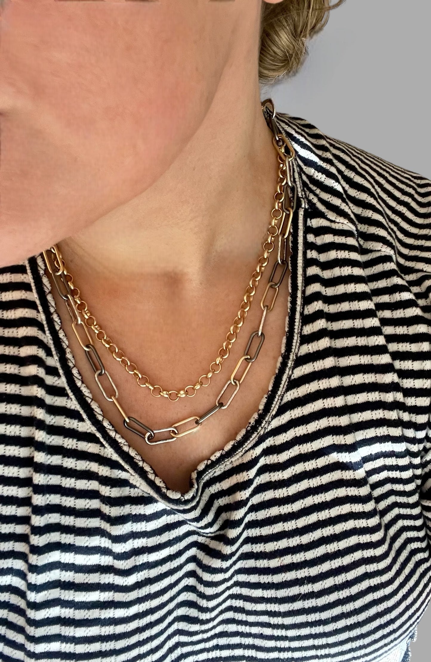 Double Chain Layering Necklace: A brushed gold Rolo chain and a Tri-tone Paperclip chain