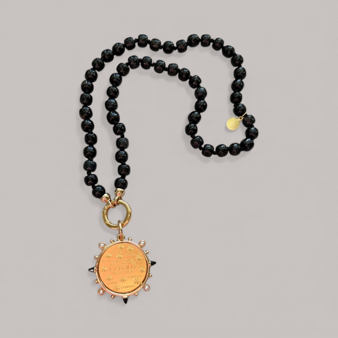 Très Chic Necklace: Hand knotted Black Onyx beads with a French Replica Vintage Pendant OOAK