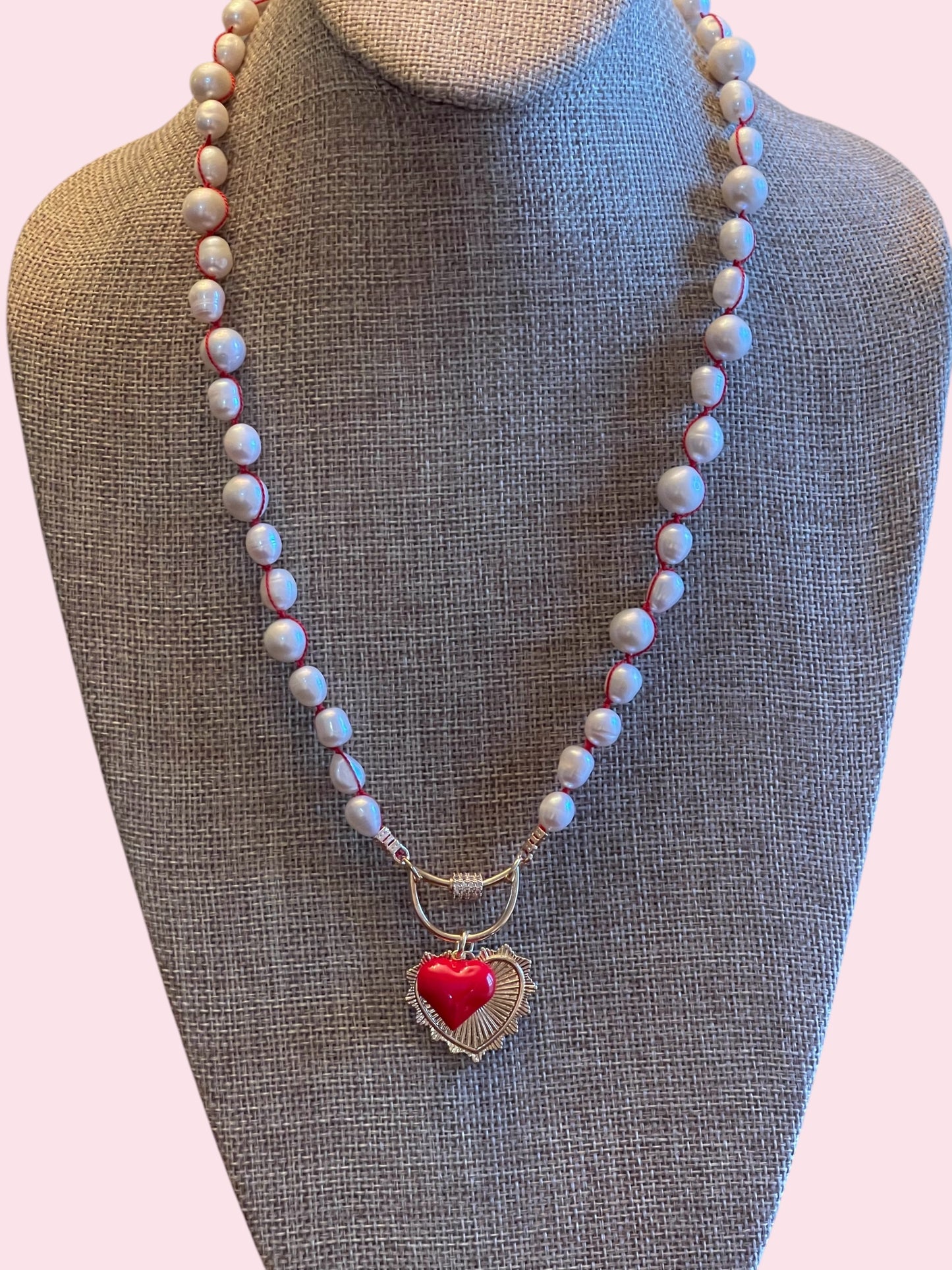 The Heartstrings Necklace: Luminous high quality freshwater pearls hand knotted on red silk w/ gold and red enameled heart charms, pavé accented clasp/charm holder OOAK