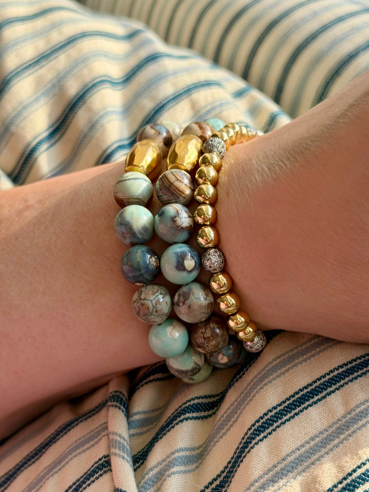 Painted Sky Stretch Bracelet: Blue Crazy Lace Agate beads with Gold hammered Artisan barrel bead