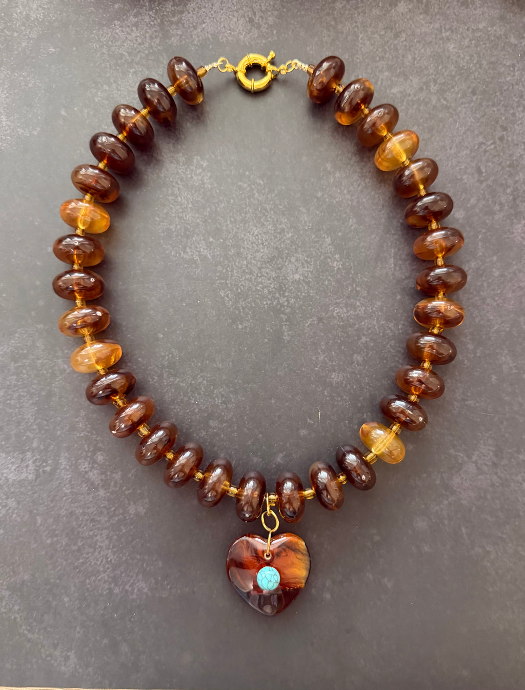 The Wanderheart Necklace: Tortoiseshell beads with a Turquoise centered heart pendant