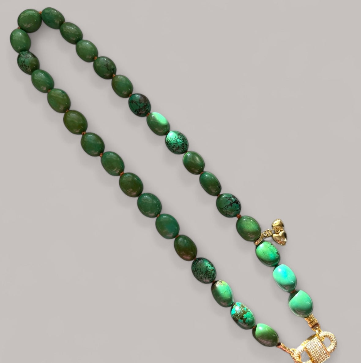 The Verdura: Green Turquoise beads Handknotted on warm brown silk Gold Pavé Clasp & Charms