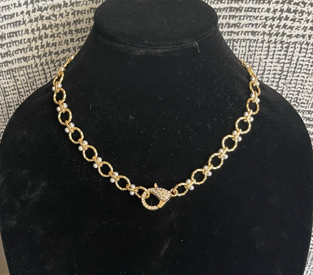 Heather Necklace: Brushed gold circle chain with brushed silver accents and oversized pavé clasp