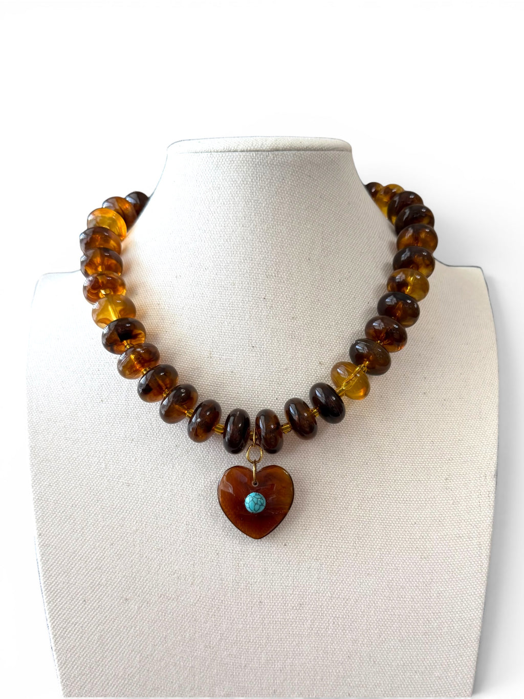 The Wanderheart Necklace: Tortoiseshell beads with a Turquoise centered heart pendant