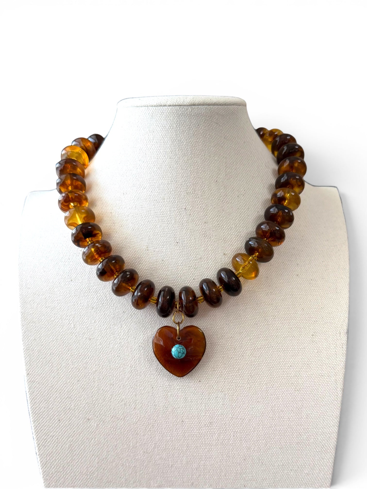 The Wanderheart Necklace: Tortoiseshell beads with a Turquoise centered heart pendant