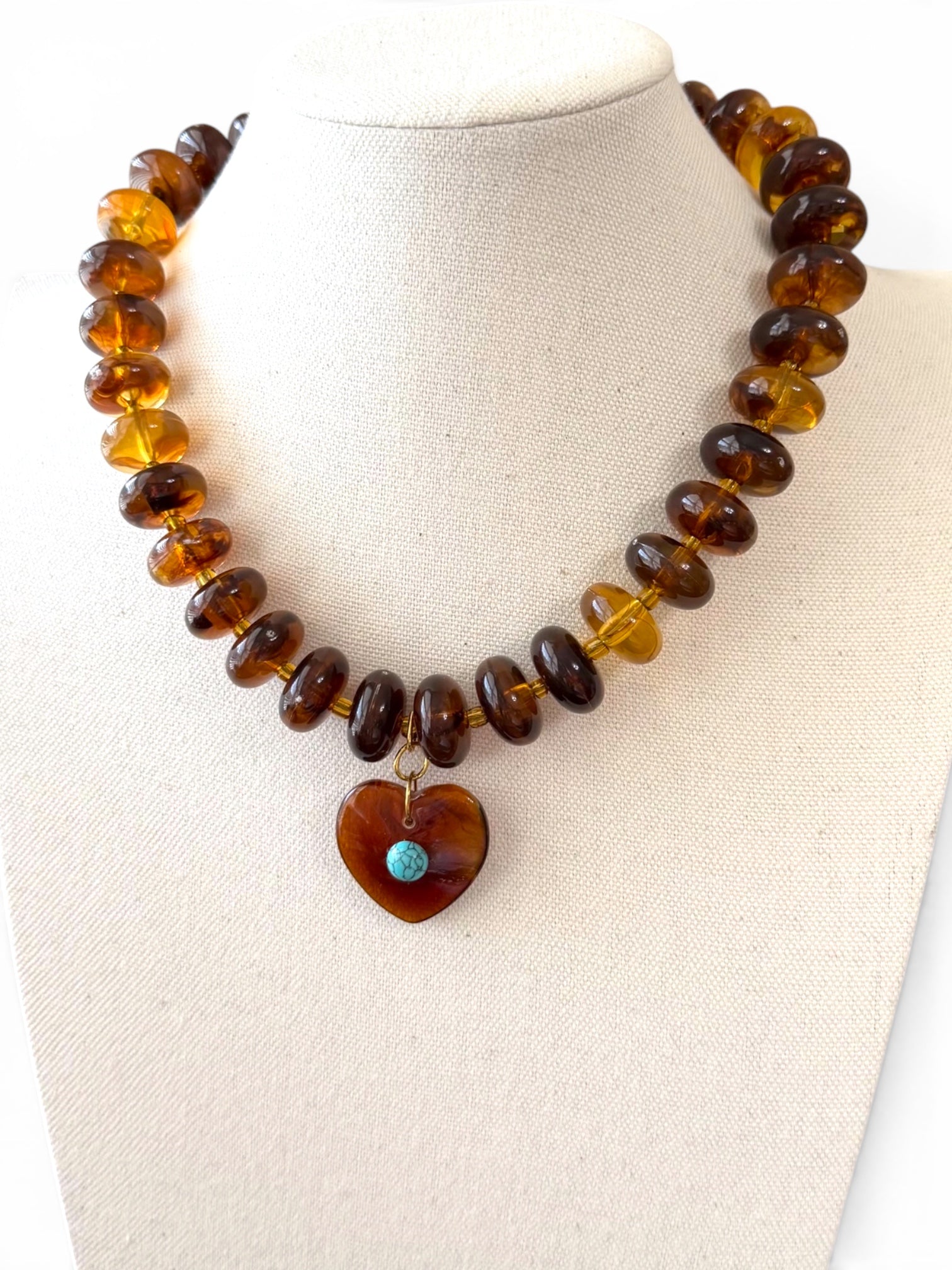 The Wanderheart Necklace: Tortoiseshell beads with a Turquoise centered heart pendant
